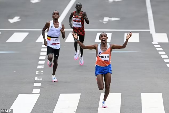 king kipchoge olympic marathon title sapporo